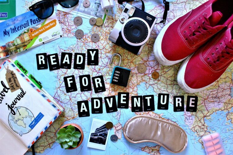 black and silver dslr camera on table - stress free travel